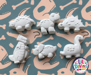 Dinosaurs - Medium DIY Painting Kit showing examples of the unpainted designs